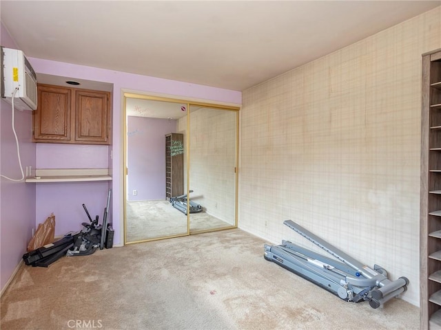 1234 N Ontario St, Burbank, CA 91505 - exercise room featuring carpet flooring, an AC wall unit, and wallpapered walls