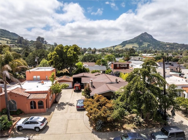 aerial view of residential area with mountains