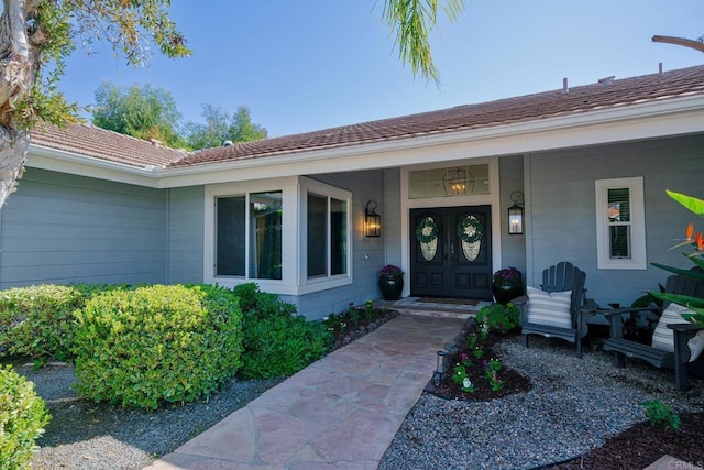 property entrance featuring covered porch