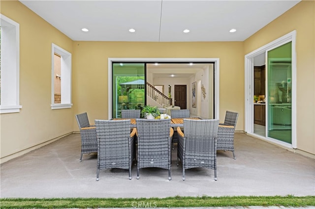 view of patio with outdoor dining space