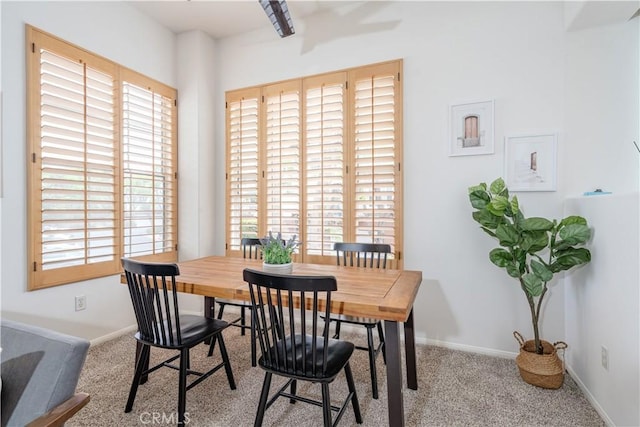 12671 Nicklaus Ln, Tustin, CA 92782 - dining space featuring plenty of natural light, carpet, and baseboards