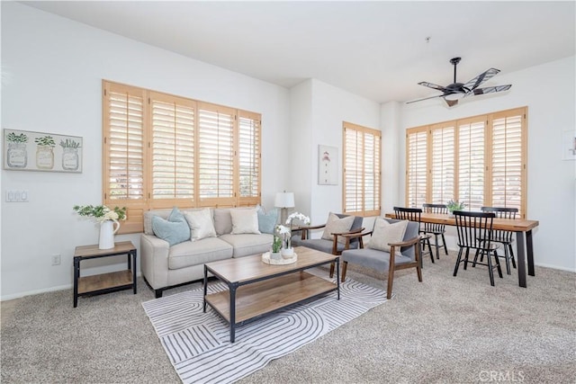 12671 Nicklaus Ln, Tustin, CA 92782 - carpeted living area with a ceiling fan and baseboards