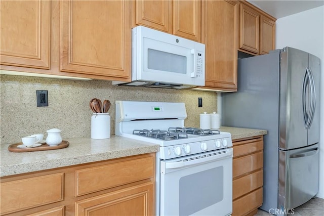 12671 Nicklaus Ln, Tustin, CA 92782 - kitchen featuring white appliances and tasteful backsplash