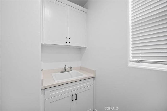bar featuring a sink