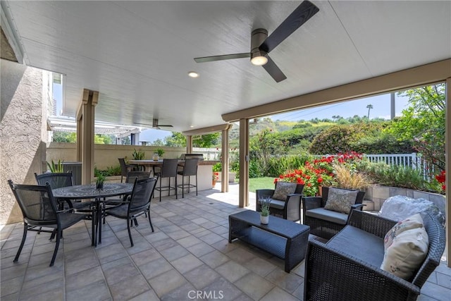 6060 E Summit Ct, Anaheim Hills, CA 92807 - view of patio / terrace featuring fence, an outdoor hangout area, and a ceiling fan