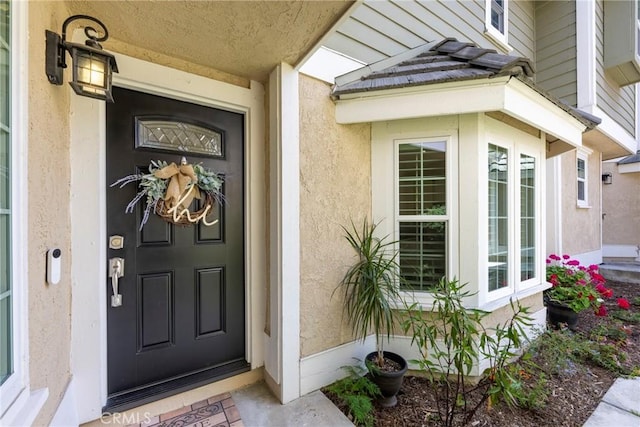 6060 E Summit Ct, Anaheim Hills, CA 92807 - view of exterior entry with stucco siding