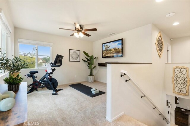 workout room featuring carpet, ceiling fan, baseboards, and recessed lighting