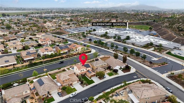 view of property location featuring nearby suburban area