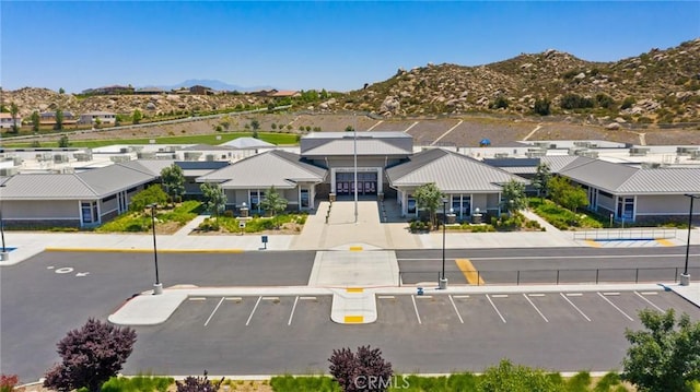 aerial perspective of suburban area with a mountain backdrop