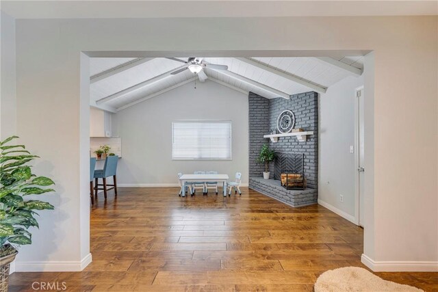 812 N Fern St, Orange, CA 92867 - living room featuring wood finished floors, a ceiling fan, and a fireplace