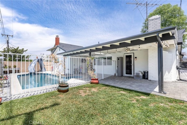 812 N Fern St, Orange, CA 92867 - back of house with a chimney, brick siding, and a patio area