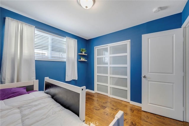 812 N Fern St, Orange, CA 92867 - bedroom featuring wood finished floors and baseboards