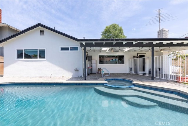 812 N Fern St, Orange, CA 92867 - view of swimming pool with a patio, fence, a ceiling fan, and a pool with connected hot tub
