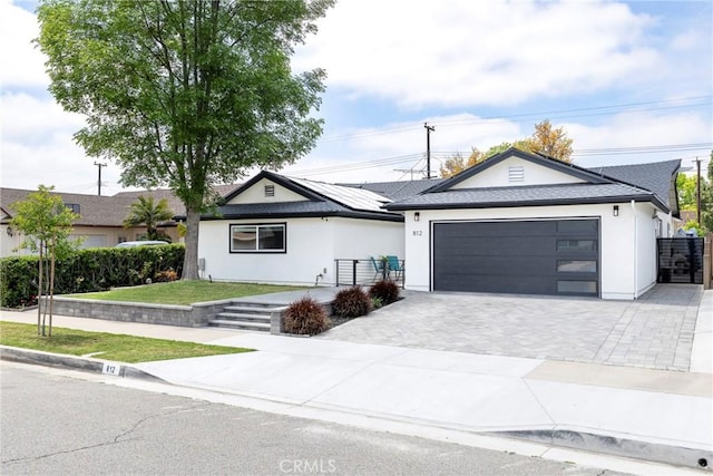 812 N Fern St, Orange, CA 92867 - single story home with a garage, stucco siding, driveway, and a front yard