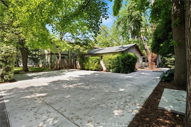 1001 Salem St, Chico, CA 95928 - view of home's exterior featuring stucco siding and fence