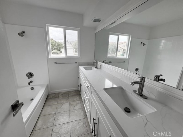 12406 Benson Ave, Chino, CA 91710 - bathroom featuring plenty of natural light, bathing tub / shower combination, baseboards, and double vanity