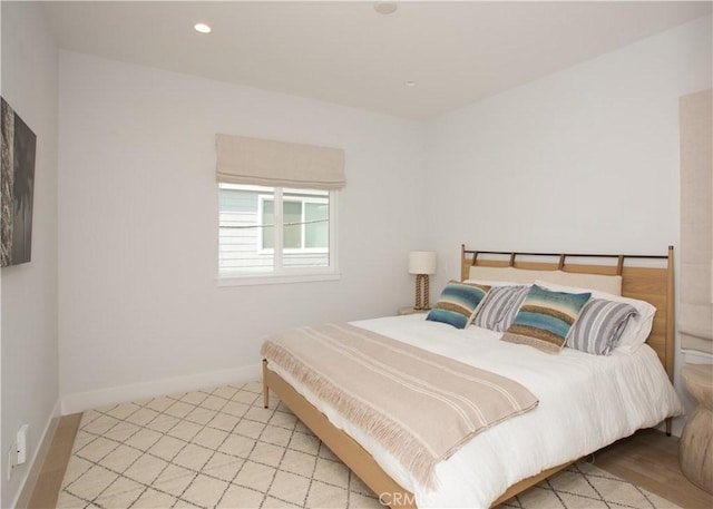 bedroom featuring baseboards