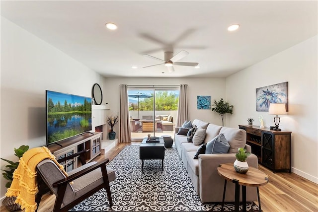 280 S Avenida Caballeros Unit 266, Palm Springs, CA 92262 - living room with ceiling fan, light wood-style floors, recessed lighting, and baseboards