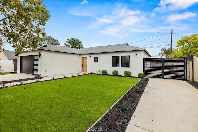 6838 Belmar Ave, Reseda, CA 91335 - view of front of house with stucco siding, driveway, an attached garage, and roof with shingles
