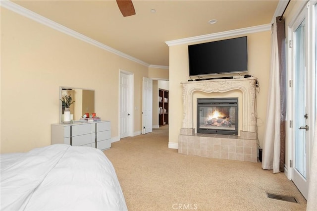 12336 Circula Panorama, North Tustin, CA 92705 - carpeted bedroom with crown molding, a glass covered fireplace, and ceiling fan