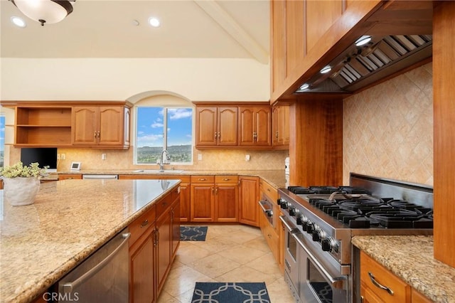 12336 Circula Panorama, North Tustin, CA 92705 - kitchen featuring appliances with stainless steel finishes, premium range hood, light stone counters, backsplash, and brown cabinetry