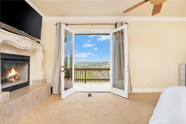 12336 Circula Panorama, North Tustin, CA 92705 - carpeted bedroom with access to exterior, crown molding, a fireplace, and ceiling fan
