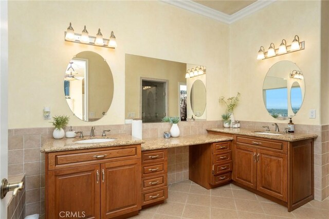 12336 Circula Panorama, North Tustin, CA 92705 - full bath with tile walls, two vanities, tile patterned flooring, ornamental molding, and wainscoting