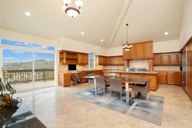 12336 Circula Panorama, North Tustin, CA 92705 - dining room featuring a chandelier, high vaulted ceiling, light tile patterned flooring, plenty of natural light, and beamed ceiling