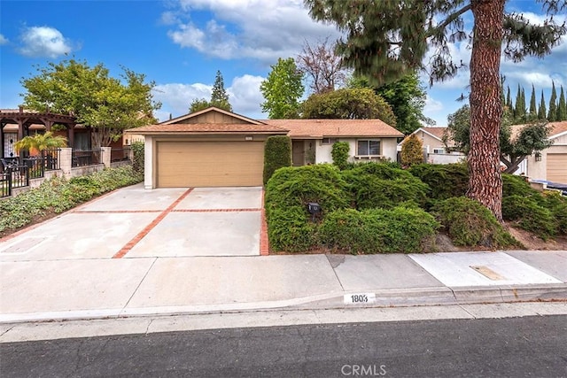 1803 Blue Haven Dr, Rowland Heights, CA 91748 - ranch-style house with concrete driveway, an attached garage, stucco siding, and fence