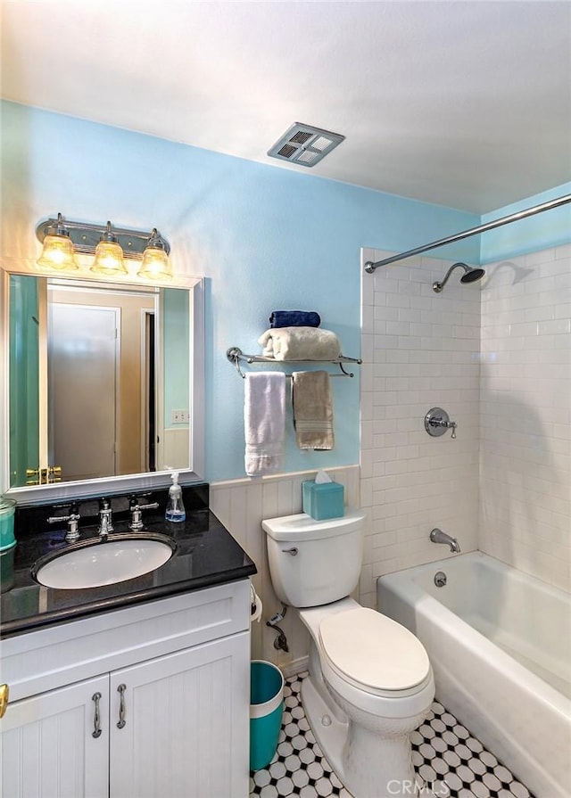 1803 Blue Haven Dr, Rowland Heights, CA 91748 - full bath featuring toilet, vanity, wainscoting, bathing tub / shower combination, and tile patterned floors