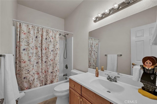 bathroom featuring shower / bath combo with shower curtain, toilet, vanity, and tile patterned flooring