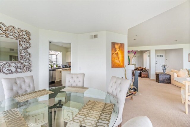 dining space with carpet
