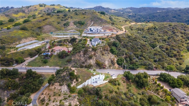 aerial view of property's location with mountains