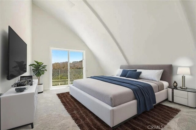bedroom featuring light colored carpet and high vaulted ceiling