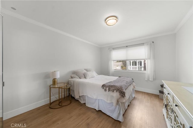 20011 Colgate Cir, Huntington Beach, CA 92646 - bedroom featuring crown molding, baseboards, and light wood-style floors