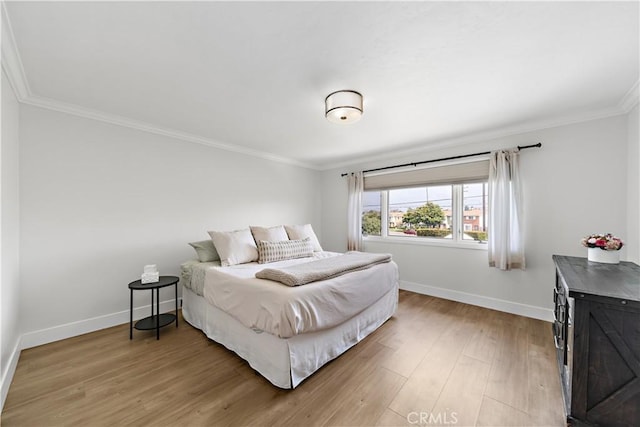 20011 Colgate Cir, Huntington Beach, CA 92646 - bedroom featuring crown molding, baseboards, and light wood-style floors
