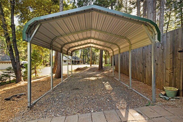 14315 Troy Way, Magalia, CA 95954 - view of vehicle parking with fence and a detached carport