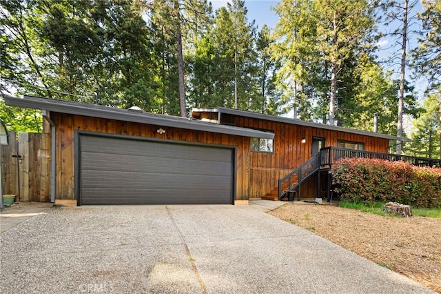 14315 Troy Way, Magalia, CA 95954 - view of front of house featuring driveway, a garage, and stairway