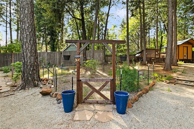14315 Troy Way, Magalia, CA 95954 - gate with fence and an outdoor structure