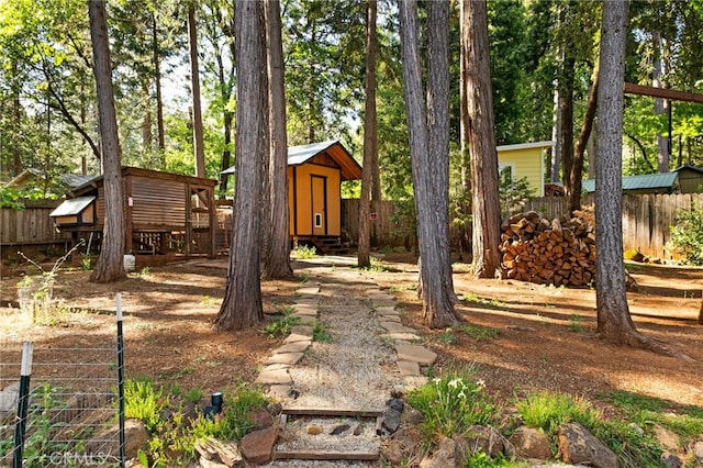 14315 Troy Way, Magalia, CA 95954 - view of yard with fence, an outbuilding, and a shed