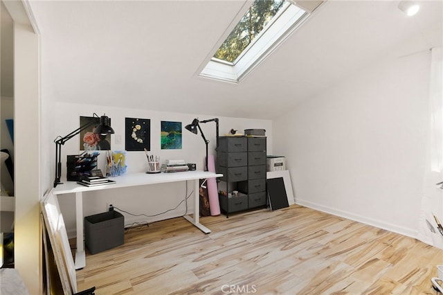 14315 Troy Way, Magalia, CA 95954 - office area with vaulted ceiling, a skylight, and light wood-style floors