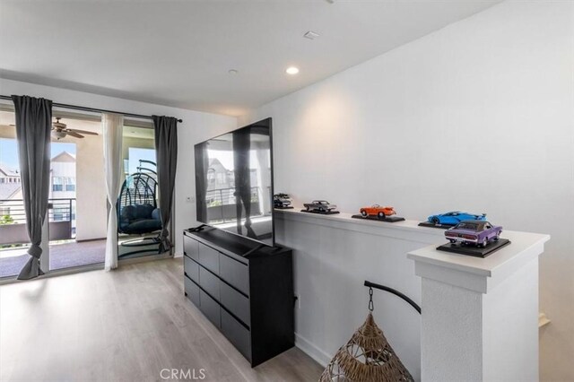 177 Frame, Irvine, CA 92618 - kitchen with light wood finished floors, recessed lighting, and light countertops