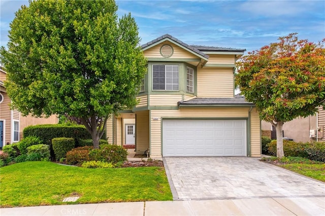 12029 Bubbling Brook St, Moorpark, CA 93021 - traditional-style home with an attached garage, a front yard, and decorative driveway