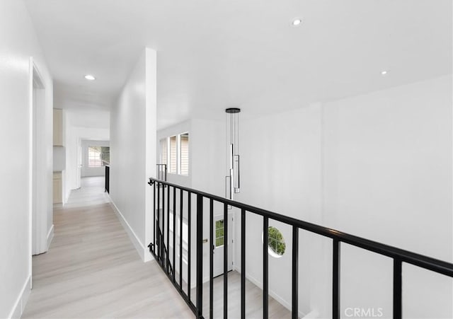 12029 Bubbling Brook St, Moorpark, CA 93021 - hall featuring light wood-style floors, recessed lighting, and baseboards