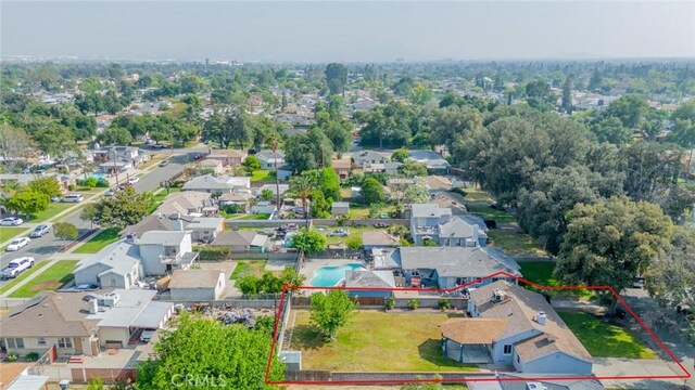3465 Sepulveda Ave, San Bernardino, CA 92404 - aerial perspective of suburban area featuring property parcel outlined