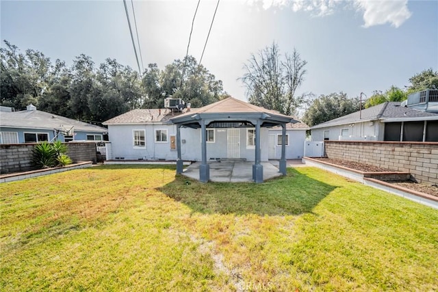 3465 Sepulveda Ave, San Bernardino, CA 92404 - rear view of property with a gazebo, a patio area, and stucco siding