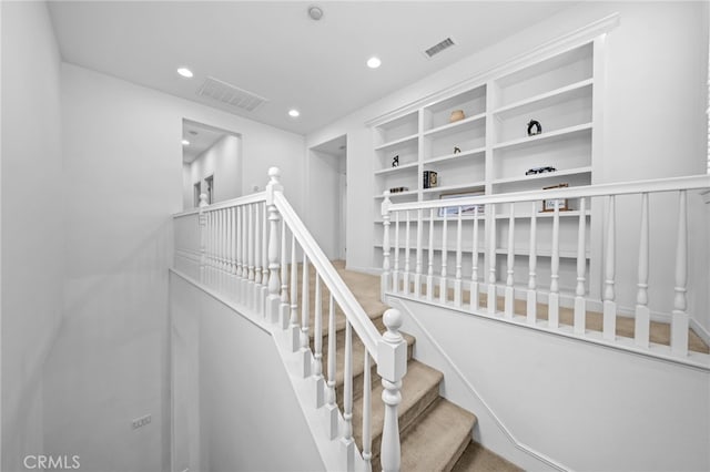 stairs with recessed lighting