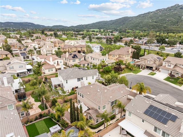 aerial perspective of suburban area featuring mountains