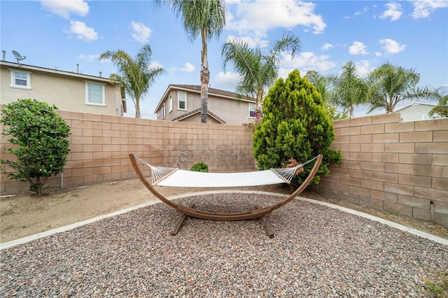 fenced backyard featuring a patio area