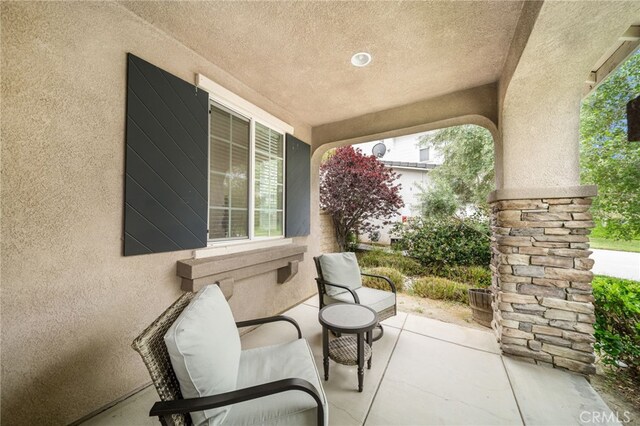 view of patio featuring covered porch